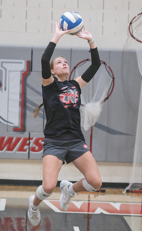 Rylee Arnold sets the ball as the Trappers worked on hitting Aug. 12. The Trappers are set to host a pair of scrimmages against Miles Community College today (Thursday) and the Northwest College alumni Friday.
Tribune photo by Seth Romsa