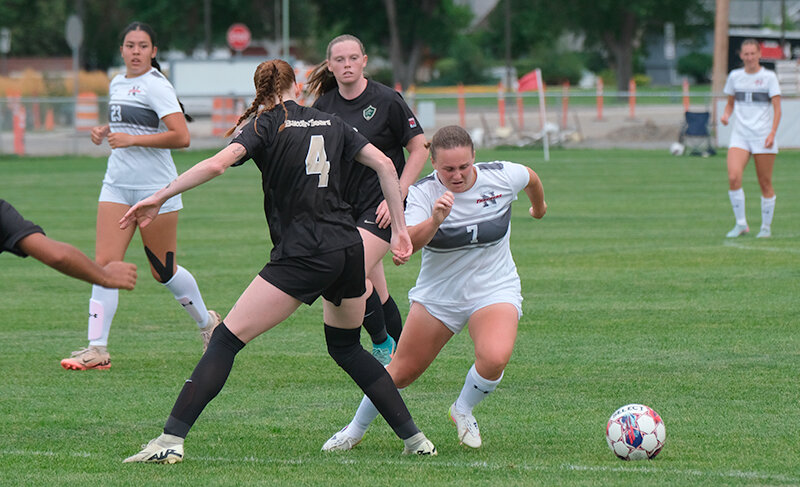 Amelia Grace Franklin works around a defender during a preseason scrimmage. She scored two of the eight goals for Northwest in the 8-0 win on Saturday.
Tribune photo by Seth Romsa