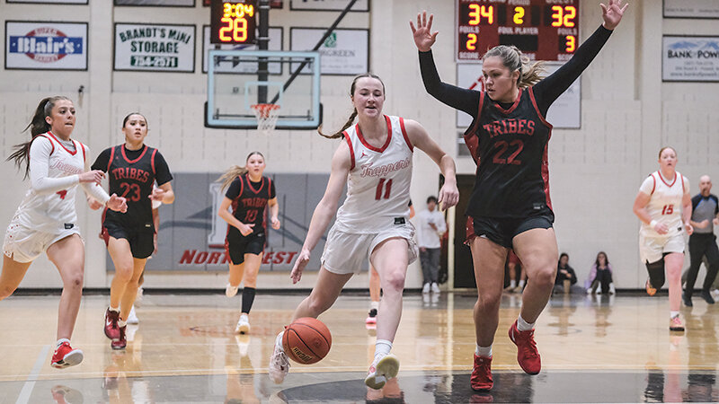 Isabella Williams drives into the lane against a United Tribes defender on the break, as the Trappers went 2-2 during a busy home week.