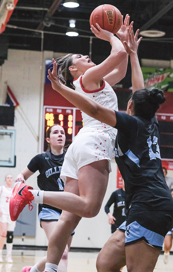 Addison Hickey finishes at the rim against the Pronghorns on Saturday. The Trappers avenged their only Region IX North loss of the season with the Saturday victory.