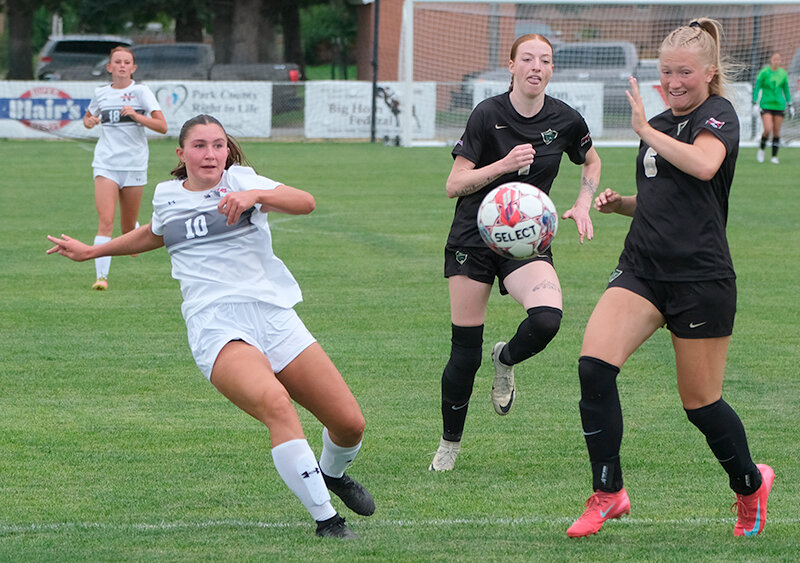 Elli Lewis (left) fires a shot on net during a preseason scrimmage. Lewis had the lone goal for the Trappers on the road at Western Wyoming on Friday.
Tribune photo by Seth Romsa