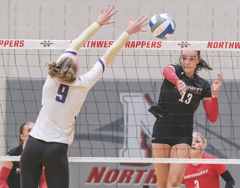 Taylee Carlson (right) watches her shot fly past the outstretched hands of a Carroll College blocker. Carlson filled in as a middle blocker while also playing as a right side hitter for the Trappers during their 3-0 weekend at home.
Tribune photo by Seth Romsa