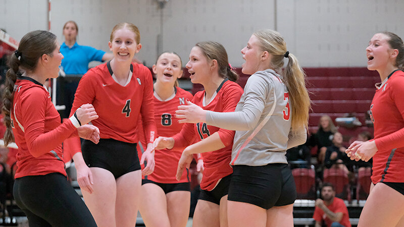 The Trappers celebrate a kill by Lexie Arnold during their match against Central Wyoming on Wednesday. From left: Lexie Arnold, Eva Murrary, Aidann Mottishaw, Rylee Arnold, Shilah Arnold and McKinlee Scammon.